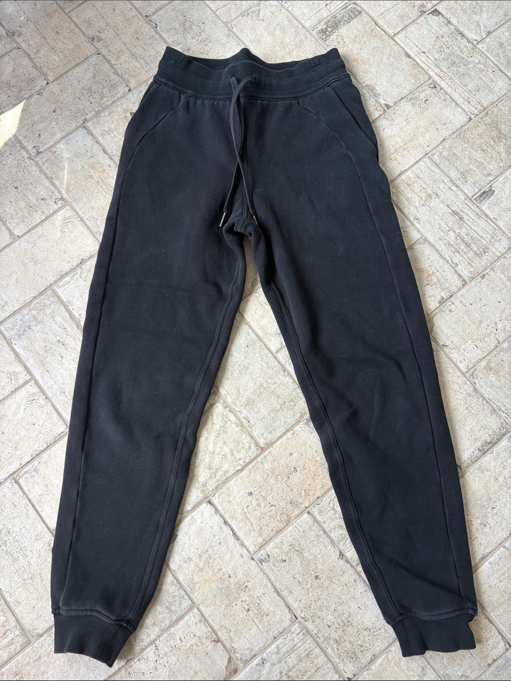 lululemon athletica size 4 Black Jogger Sweatpants. Hole near pocket